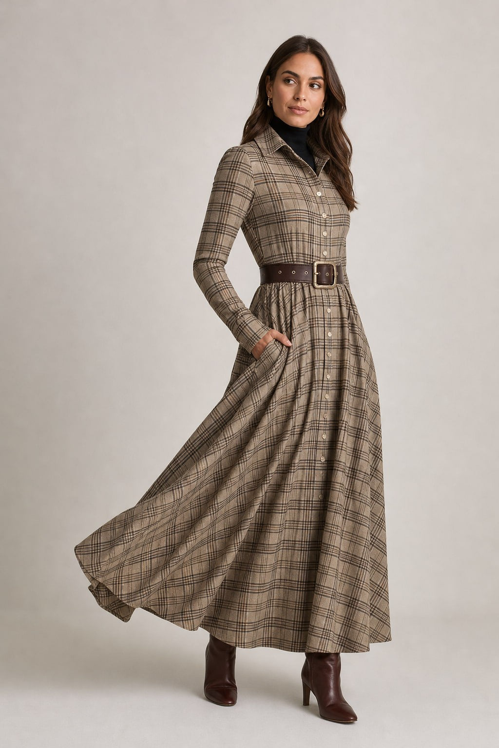 Robe chemise longue à carreaux kaki vue de trois-quarts, main dans la poche latérale